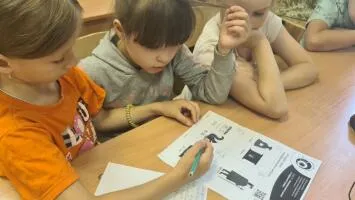 Познавательная беседа "Путешествие в мир финансов" (отгадывание ребусов)